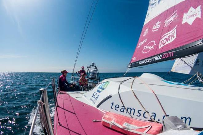 Onboard Team SCA. Day 7. Elodie Mettraux, Sally Barkow and Sam Davies trimming and driving in light air - Leg 7 to Lisbon - Volvo Ocean Race © Anna-Lena Elled/Team SCA